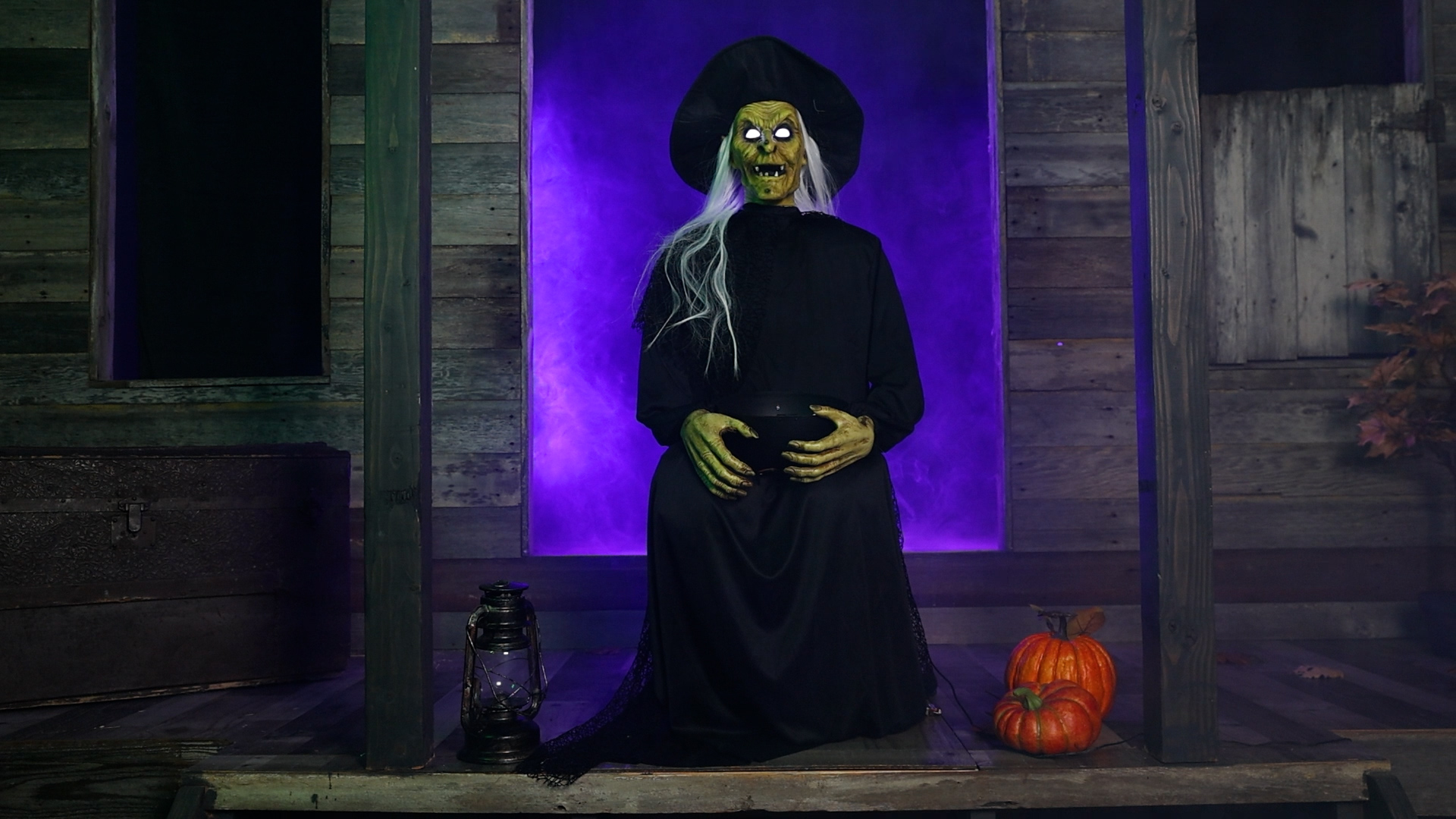 Add a magical and mischievous touch to your Halloween night with this exclusive 3.5FT Animated Seated Witch Holding Candy Bowl. Guests will think twice before grabbing a sweet treat!